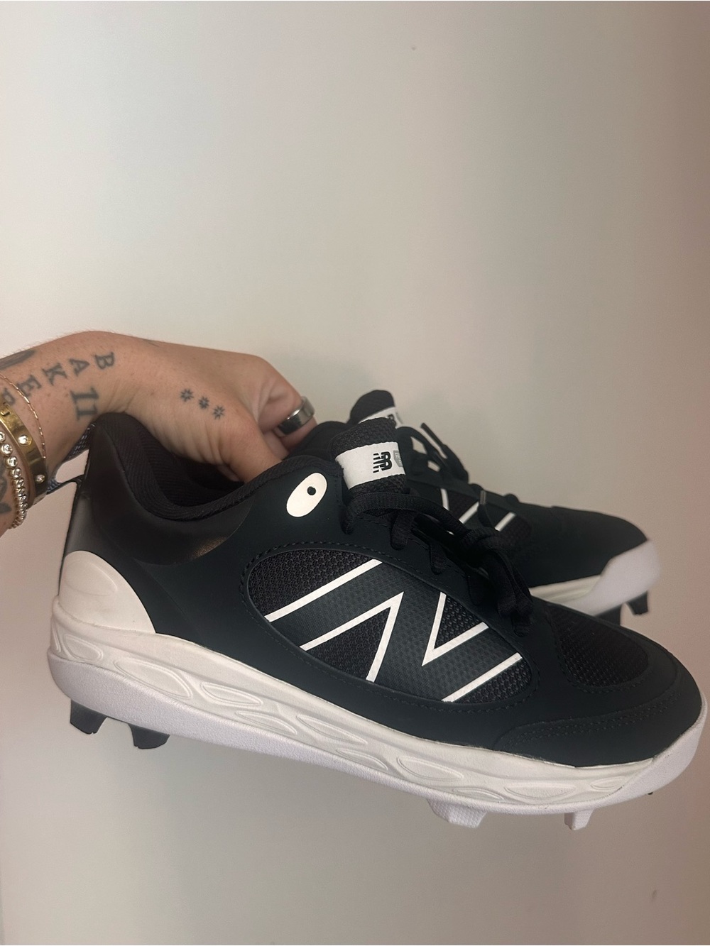 New Balance Black and White Kids Athletic Cleats